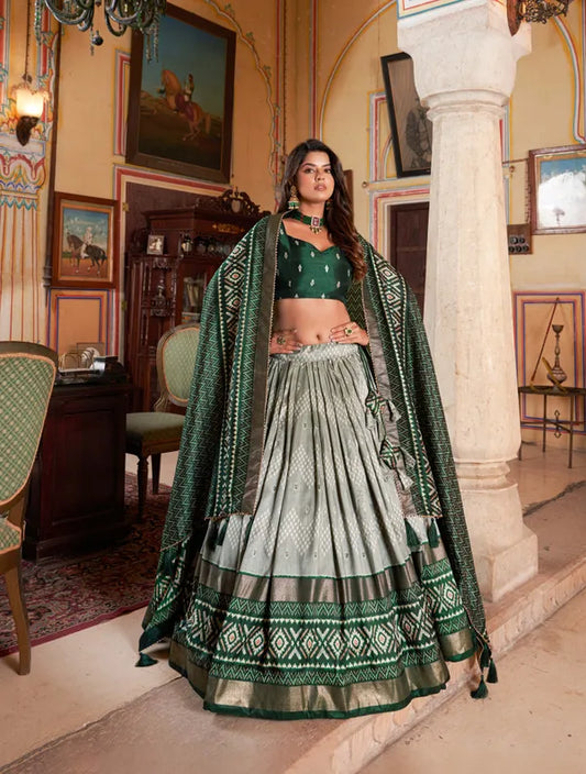 Green Color Silk Lehenga Choli With Patola Print Dupatta